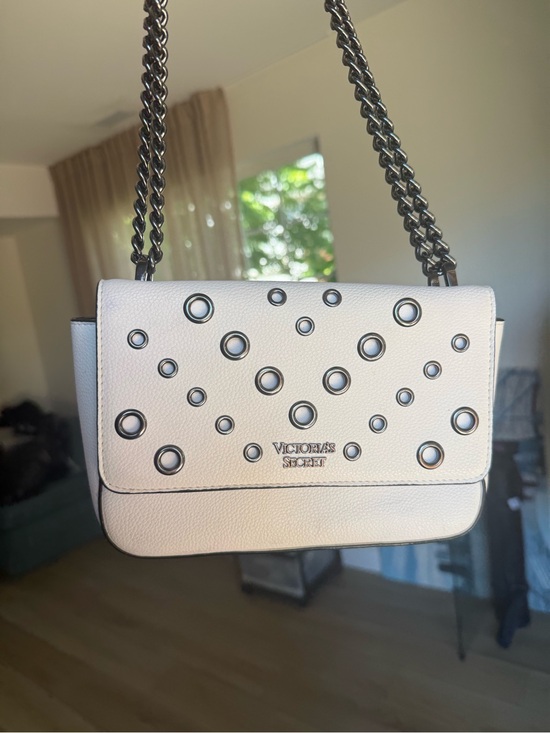 Victoria's Secret Handbags - Victoria's Secret White Grommet Crossbody Bag with Chain Strap